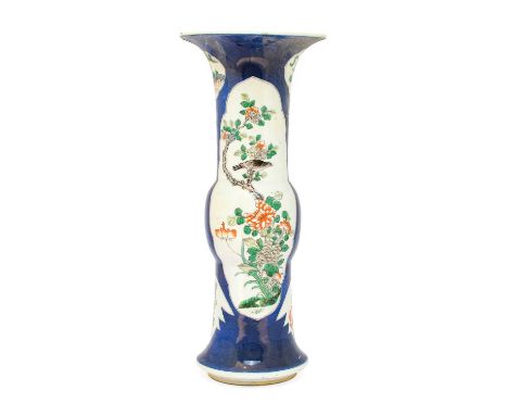 A Chinese Porcelain Beaker Vase, Kangxi reign mark but not of the period, with flared neck and swept base, painted in famille