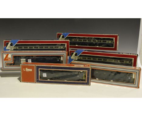 A small collection of Lima gauge OO railway items, including three diesel locomotives, seven coaches and six parcel wagons, a