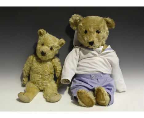 A Chiltern mohair teddy bear with amber and black eyes, stitched snout and jointed body with fabric pads and stitched claws, 