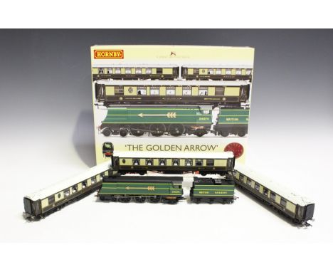 A Hornby gauge OO R.2369 The Golden Arrow train pack and R.4196 The Golden Arrow coach pack, both boxed.Buyer’s Premium 29.4%