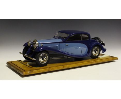 A Pocher 1/8th scale kit-built model of a 1932 Bugatti Coupé De Ville, finished in duo blue, with box, instruction book and o