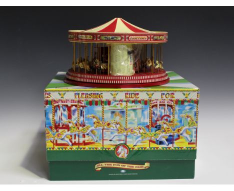 A Corgi Fairground Attractions 2002 CC20402 Carter's Steam Gallopers, a CC10706 Scammell Highwayman box trailer and roofload 