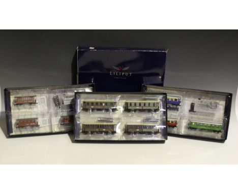 A small collection of Lilliput First Class gauge OO/HO and HOe railway items, comprising a No. L109120 tank locomotive, boxed