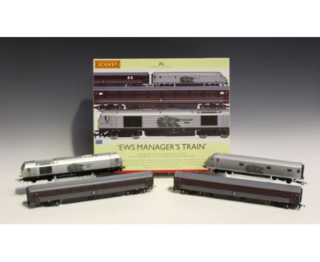 A Hornby gauge OO R.2980 EWS Manager's Train set, boxed, three R.4013 Eurostar passenger saloons, all boxed, a Eurostar dummy