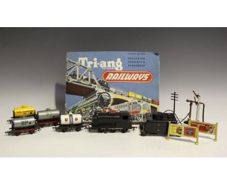 A Tri-ang gauge OO RGX train set, including a tank engine, various wagons and tankers and a controller, together with a catal