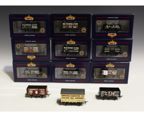 Twenty-two Bachmann Branch-Line gauge OO Collectors Club and Exclusive for Buffers goods rolling stock, including a No. 37-10