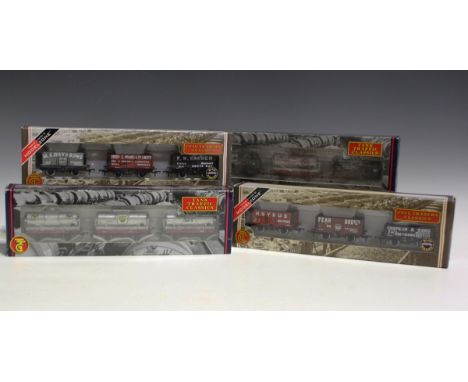 Thirty-one items of Bachmann Branch-Line gauge OO goods rolling stock, including a No. 37-665 set of three 14-ton tank wagons