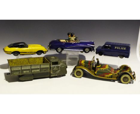 A collection of tinplate vehicles, including a Chinese Photoing on Car, a Chad Valley camouflage searchlight vehicle (missing