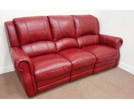 Three seat manual reclining sofa with fold out table (), and matching armchair (), upholstered in red buffalo leather Conditi