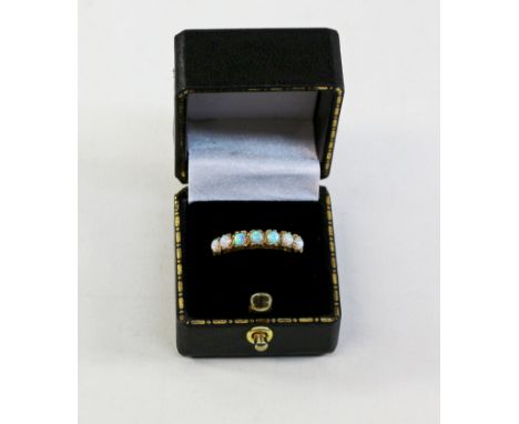 Opal seven stone silver-gilt ring Condition Report Click here for further images, condition, auction times & delivery costs
