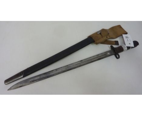 WWI military bayonet in original sheath and hopper Condition Report Click here for further images, condition, auction times &