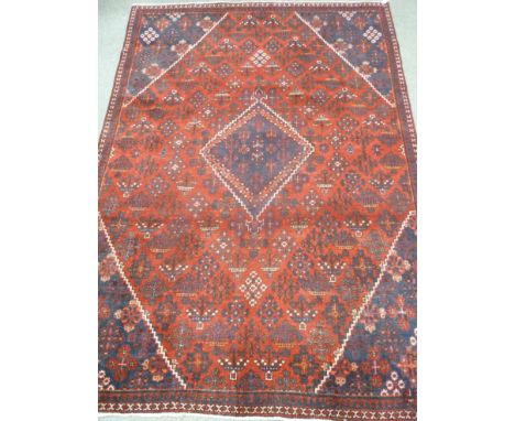 Meimeh carpet, central diamond over red ground, all over floral design, spandrels, double boarder, 350cm x 235cm Condition Re