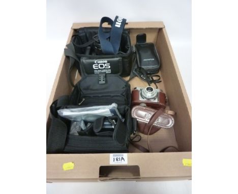 Canon EOS 1000F SLR camera, a digital video camera, Vintage camera and one other in one box  Condition Report Click here for 