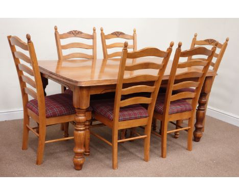 Rectangular hardwood dining table raised on turned legs (166cm x 98cm, H75cm), with set six ladder back chairs with upholster