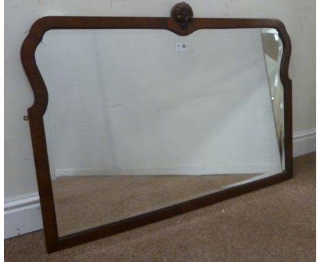 Mahogany framed mirror of shaped rectangular form mounted by shell finial, W 94cm, H 69cm Condition Report Click here for fur