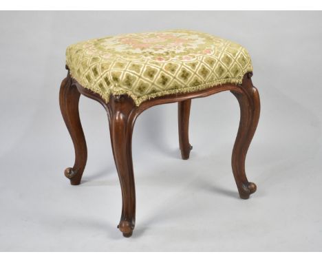 A Mahogany Framed Tapestry Upholstered Dressing Table Stool with Cabriole Supports, 47cms Wide