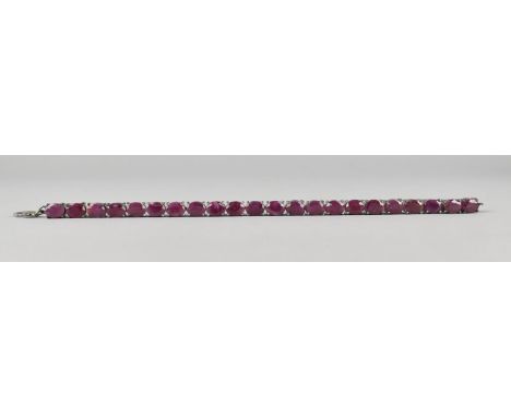 A Silver and Ruby Tennis Bracelet, 20cm long