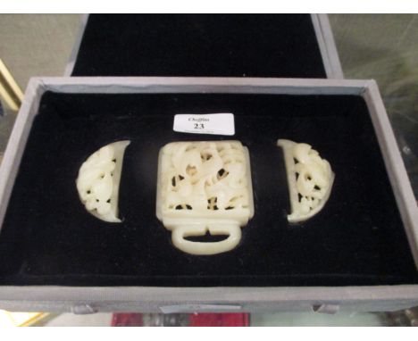 A Chinese jade three piece buckle  All in good condition, box a bit grubby.