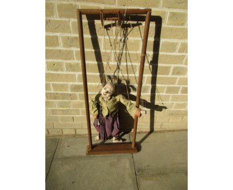 EG. A Malaysian puppet on strings within a wooden frame, the frame 95 x 37cm (37.5 x 14.5 in)  