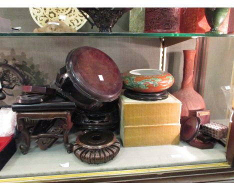 A Chinese Red ware bottle vase, and Chinese dish and various Chinese hardwood stands  The main large stand in overall good co