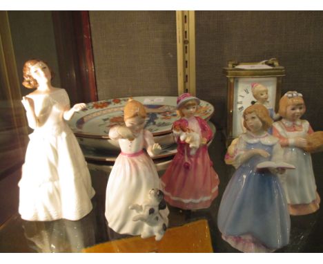 A carriage clock together with six figures of young girls and four Chinese plates (11)  