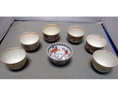 A pair of Meissen tea bowls for the Ottoman market and five others, the first pair gilt with inscriptions on the rims, three 