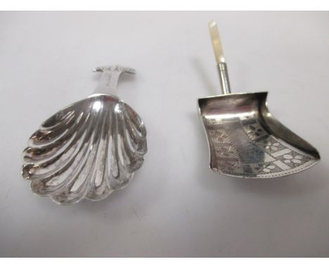A George III silver caddy shovel by William Pugh, Birmingham 1811 with MOP handle and another modern shell bowl caddy spoon  