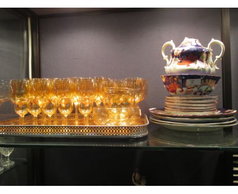 A quantity of amber lustre drinking glasses together with a quanity of mixed ceramics to include three Jesus College plates, 