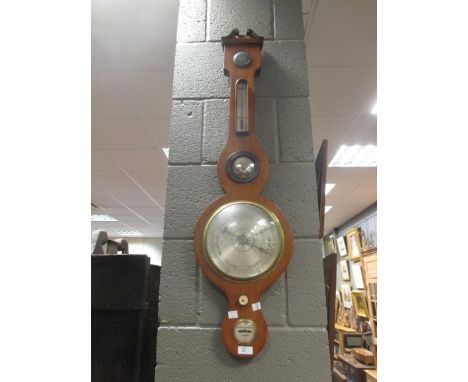A Victorian mahogany wheel barometer by 'Negretti'  