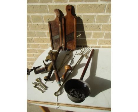 EG. A collection of miscellaneous items, to include: brass ember tongs, a table fitting cork screw, a strainer, two vegetable