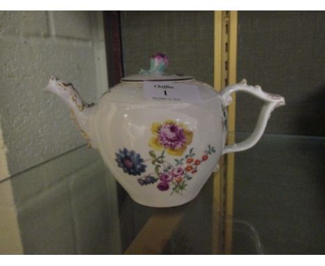 A Meissen teapot with moulded lattice border the globular body painted with flowers with an associated lid, blue cross sword 