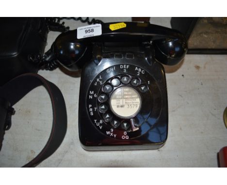 A rotary dial Bakelite telephone 
