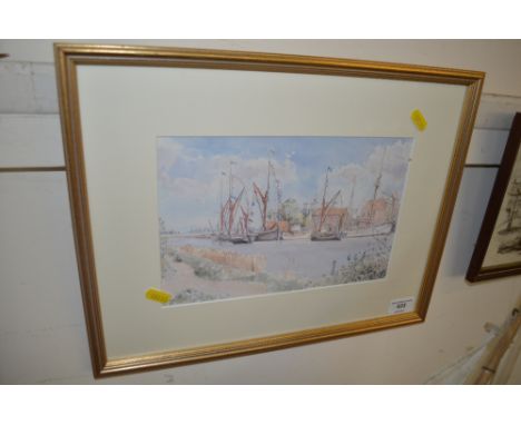A gilt framed print depicting snape maltings, after John Western 