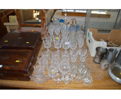 A quantity of glassware to include cut glass drinking glasses; decanter and stopper; cut glass vase etc