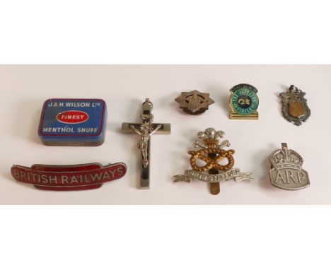 A collection of vintage items including British Railways enamel badge,military cap badges, Silver A.R.P badge, Silver medal e