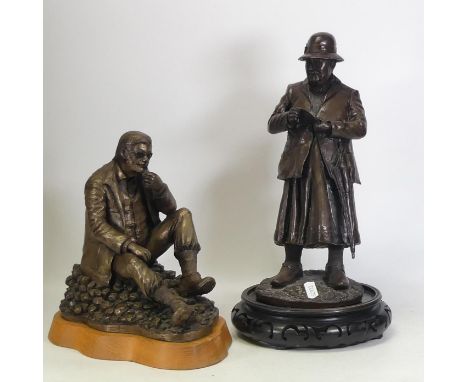 Two resin figures one of man seated smoking a pipe and a lady holding an umbrella reading a book (2)