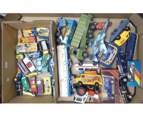 A collection of boxed and used toy cars to include Matchbox Lesney Tractor, Mercedes, Pinder circus bus, advertising vans, Di