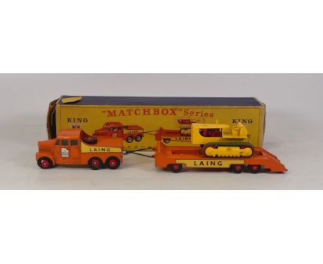 A Boxed Matchbox King Size K-8 Laing Prime Mover Transporter with Caterpillar Tractor Trailer.