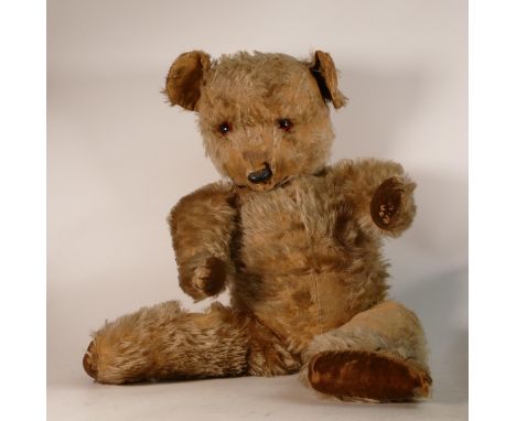 Vintage mohair jointed teddy bear with glass eyes. Length 62cm