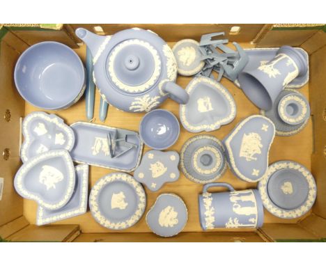 A collection of Wedgwood Jasperware items to include lidded boxes, candlestick holders, pin dishes, jug, sugar bowl, teapot, 