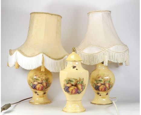 A pair of Aynsley Orchard Gold lamp bases with shade together with a temple jar (3)