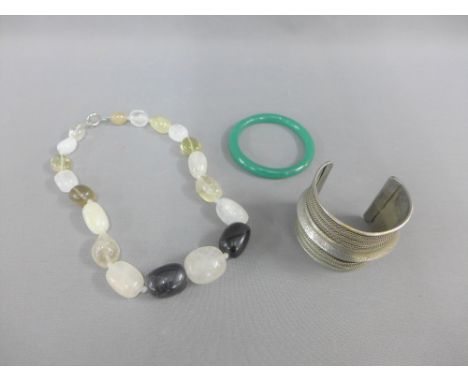 Mixed lot to include a white metal cuff bangle, hard stone beads and bangle (3) 