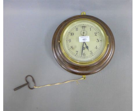 Oak cased wall clock with silvered dial and Arabic numerals, 30cm diameter 