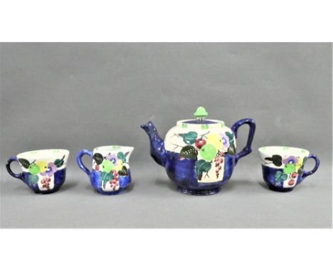 Mak Merry, hand painted Scottish pottery table wares, to include a teapot, two cups and a milk jug, with printed back stamps,