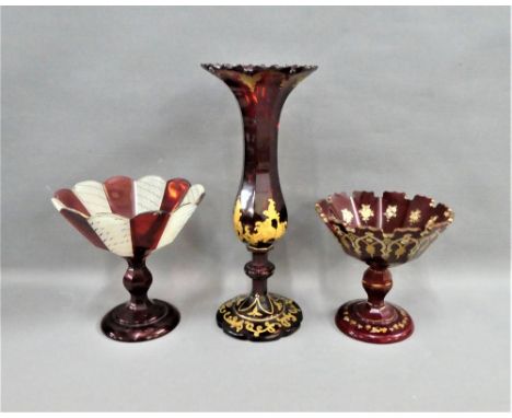 Bohemian ruby red glass to include a vase and two tazza, tallest 28 cm, (4) 