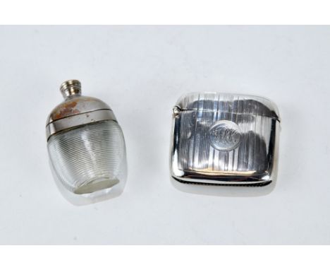 A GEORGE V SILVER LINE ENGRAVED FLIP-TOP VESTA CASE, maker: WHH, Birmingham 1915, and a Novelty ribbed glass and plated spiri