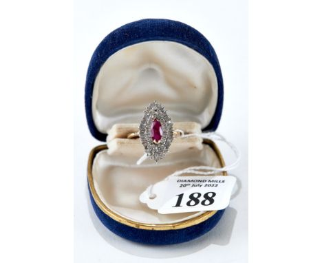 A 14K YELLOW GOLD NAVETTE RUBY AND MULTI DIAMOND RING, size S, approx 5.9 grams. £300-£500