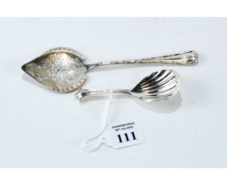 A VICTORIAN SILVER CADDY SPOON with shell bowl, maker: H.L.H.L., London 1868, and an Edwardian silver PRESERVE SPOON with fau