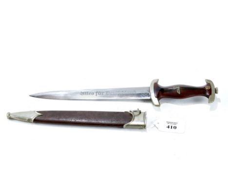 A 1939-45 GERMAN "SA" DAGGER, shaped wooden grips, nickel mounts, engraved double edge blade stamped REMEVE, soligen, with br