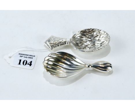 A 20th CENTURY ITALLIAN CAST WHITE METAL CADDY SPOON and a ditto CADDY SPOON of textured design, both stamped Gianmarco Bucce